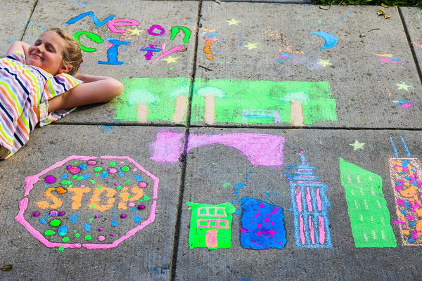Author and content creator Rebecca Green shows how to create your own sidewalk chalk mural. Sidewalk art is a fun and creative way to make art and is the perfect family outdoor activity. Learn more!