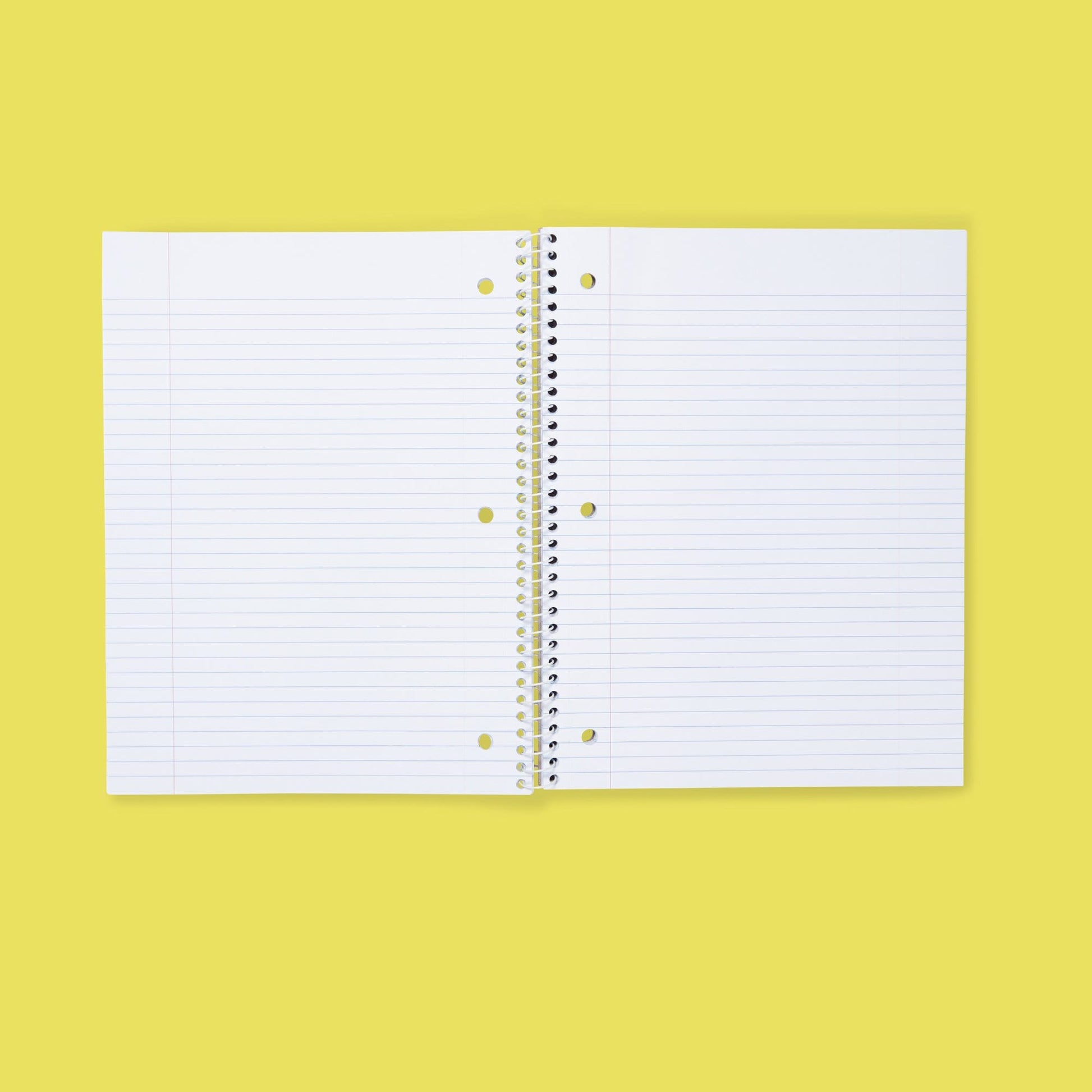 inside of open spiral one subject notebook showing college-ruled paper