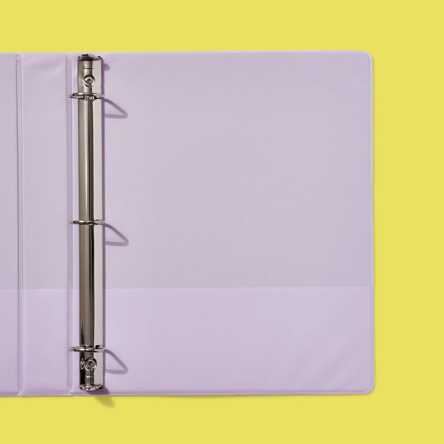 close up of inside of unicorn Spider-Man binder showing lavender solid inside detail of inside pockets and D-rings